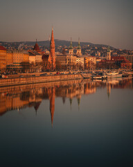Golden Hour Over Budapest with Scenic River Reflection