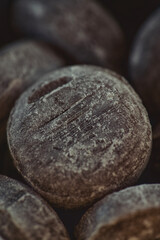 A delightful closeup view of exquisite chocolate confectionery featuring a richly textured surface