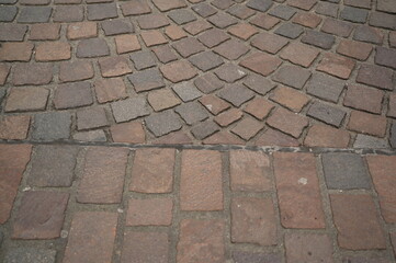 gray paving slabs as a background, pavement paved slabs as a background	
