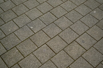 grey paving tile texture, grey tile pattern as background, grey tile texture close up	
