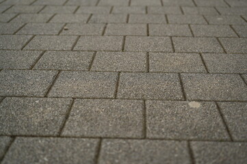 grey paving tile texture, grey tile pattern as background, grey tile texture close up	
