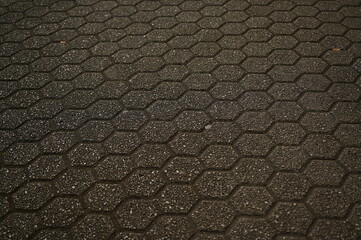 пятиугольна плитка як фон в старому місті, сіра плитка 