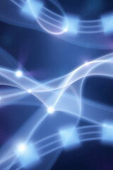 Abstract glowing light trails in a futuristic, dynamic blue design, evoking motion and cosmic energy.