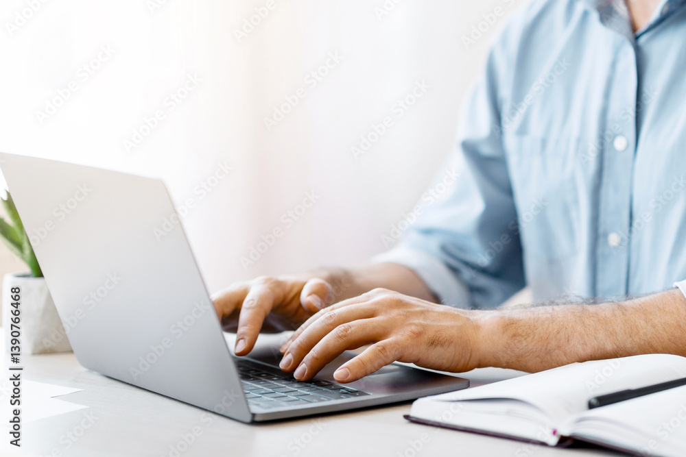 Aufkleber bearded man freelancer working on laptop at home office, typing on keyboard, sitting at desk using c