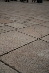 Fototapeta premium grey paving tile texture, grey tile pattern as background, grey tile texture close up 