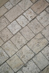 grey natural stone pavement texture, square tiles background for architecture, design, flooring, construction and urban projects