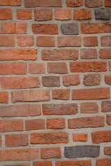 Red brick wall close up background. Vintage masonry texture of red bricks with mortar