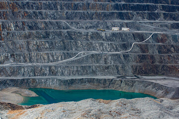 Open pit copper mine with water 