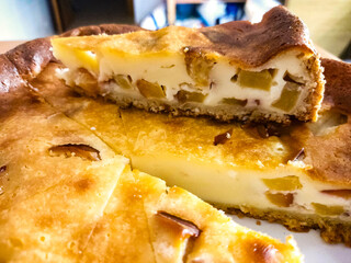 Delicious homemade pie with fruit filling. Perfect for food blogs, recipes, or portraying comfort food and sweet indulgence. A slice is isolated.