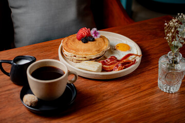 Pancake Breakfast with Fresh Berries and Coffe