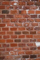 Naklejka premium red brick wall texture close-up as background texture of a red brick wall with visible mortar lines and natural wear. ideal as a background for architectural, construction, design, or urban visuals.