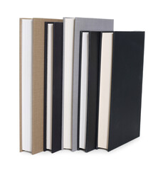 Many closed hardcover books isolated on white
