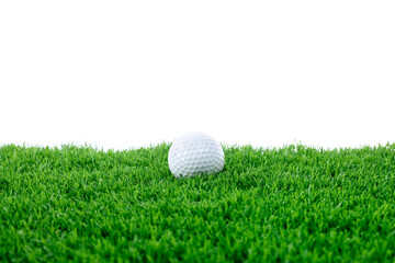 Golf ball on green grass against white background