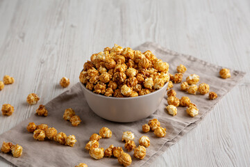 Homemade Caramel Popcorn in a Bowl, side view.