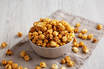 Homemade Caramel Popcorn in a Bowl, side view.