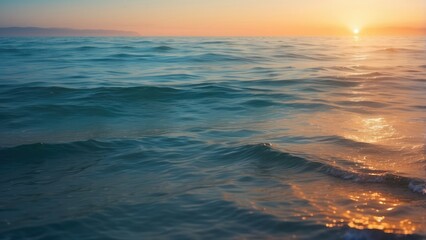 Obraz premium Close-up of a sandy shore with gentle waves lapping