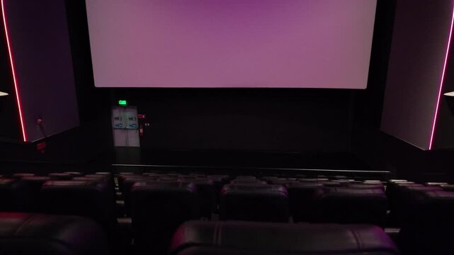 Empty Modern Cinema Screen with Ambient Purple Lighting