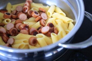 pasta penne with sausages
