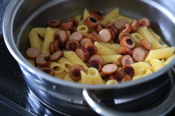 pasta penne with sausages
