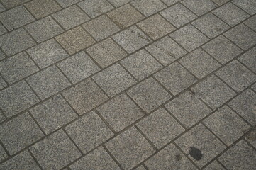 grey paving tile texture, grey tile pattern as background, grey tile texture close up	

