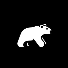 Modern minimalist bear logo featuring a white silhouette against a black background showcasing negative space design principles