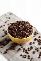 Organic Roasted Coffee Beans in a Bowl, side view.