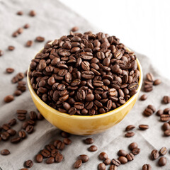 Organic Roasted Coffee Beans in a Bowl, side view.
