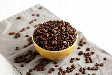 Organic Roasted Coffee Beans in a Bowl, side view.