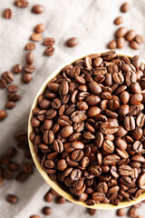 Organic Roasted Coffee Beans in a Bowl, top view.