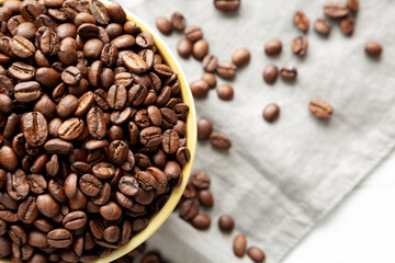 Organic Roasted Coffee Beans in a Bowl, top view.
