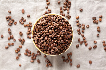 Organic Roasted Coffee Beans in a Bowl, top view.