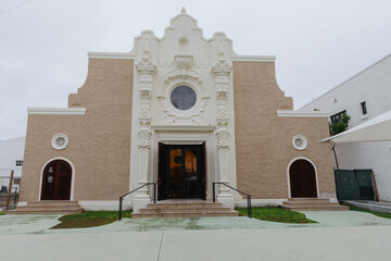 A man walks past the Miami Beach Community Church in Florida, USA. The building's architecture is a...