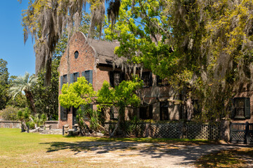 Fototapeta premium CHARLESTON, SC, USA - March 30, 2024: Main house Middleton Place is a plantation in Dorchester County, directly across the Ashley River from North Charleston, in the U.S. state of South Carolina.