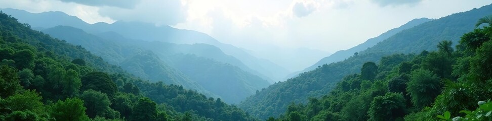 Naklejka premium Serene misty mountains and lush tropical forests of Huai Nam Dang National Park in Thailand, Huai Nam Dang, mountains