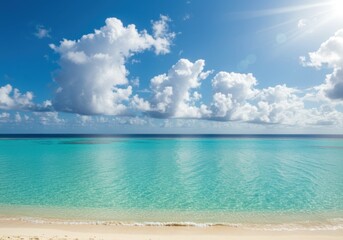 Fototapeta premium Tropical beach with turquoise water and white sand under sunlight