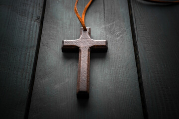 Wooden Cross on Black Background: Celebration of Resurrection