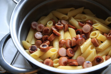 pasta penne with sausages