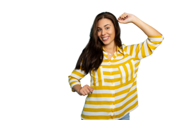 Joyful woman dancing, wearing yellow striped top, expressing happiness against transparent backdrop