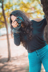 Photographer taking pictures outside, professional photographer, concept for world photography day, copy space