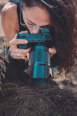 Photographer taking pictures outside, professional photographer, concept for world photography day, copy space