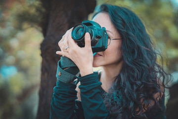 Photographer taking pictures outside, professional photographer, concept for world photography day, copy space