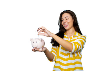 Smiling woman putting coin in piggy bank, saving money, transparent background