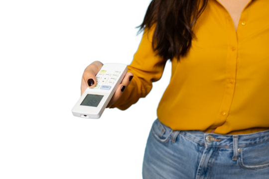 Woman using remote control, adjusting temperature of air conditioner, isolated on transparent background