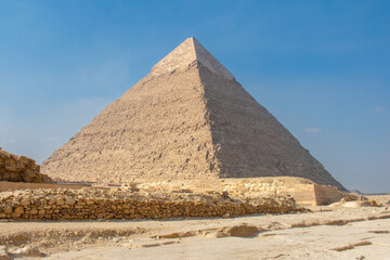 Great Sphinx and Great Pyramid of Cheops, Cairo, Egypt. Ancient statue of Sphinx, mythical creature with head of man and body of a lion, Giza pyramid complex (Giza Necropolis)