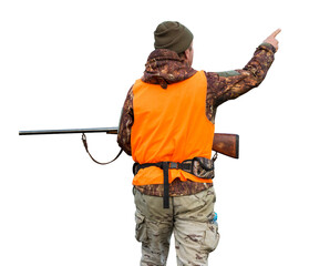 A man with a gun in his hands and an orange vest on a pheasant hunt in a wooded area in cloudy...