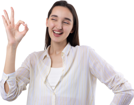 Smiling girl gesturing OK sign with her hand