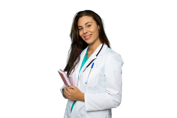 Female medical professional confidently smiling, holding notebook, wearing white coat against transparent backdrop