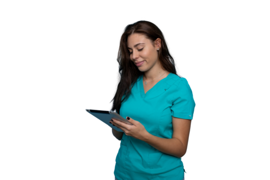 Young female doctor wearing teal scrubs using a digital tablet with a transparent background