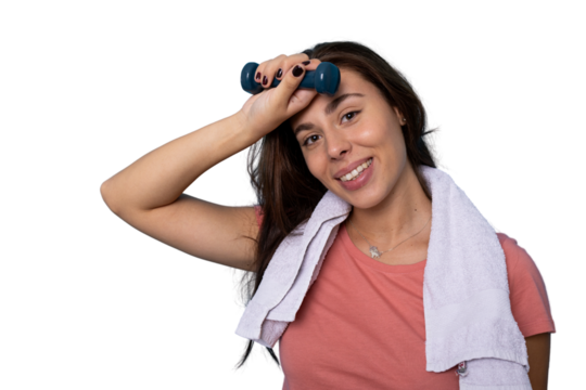 Female athlete wiping perspiration from forehead, holding dumbbell after intense training session, white background - Powered by Adobe