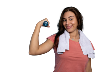 Smiling fitness woman holding a dumbbell and flexing her bicep with a towel on her shoulders on transparent background